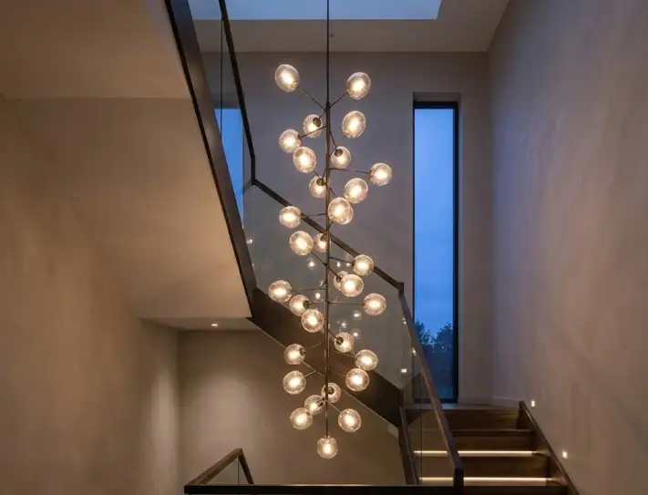 Feature staircase with discreet recessed lighting and clean cabling