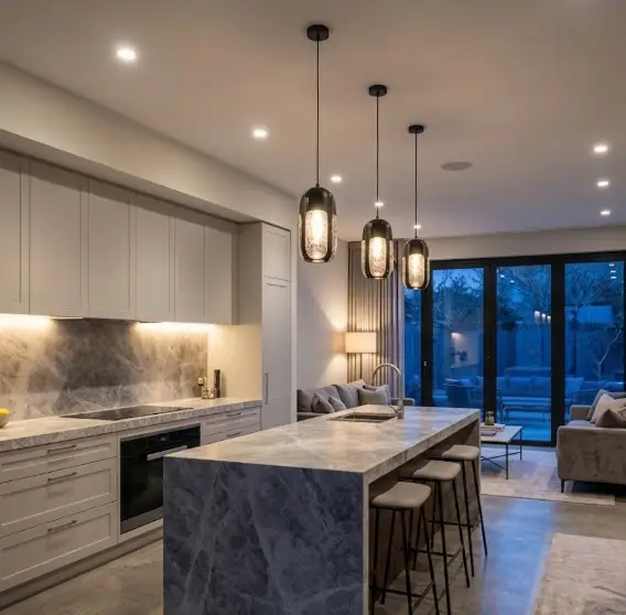 Kitchen pendant lighting installation over an island