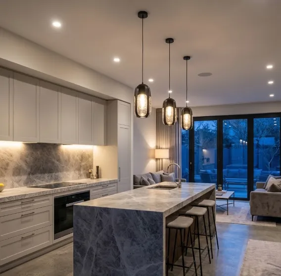 Kitchen pendant lighting installation over an island