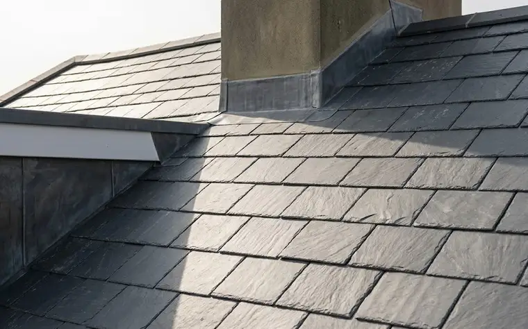 Re-roofed property with new tiles and crisp ridge detailing